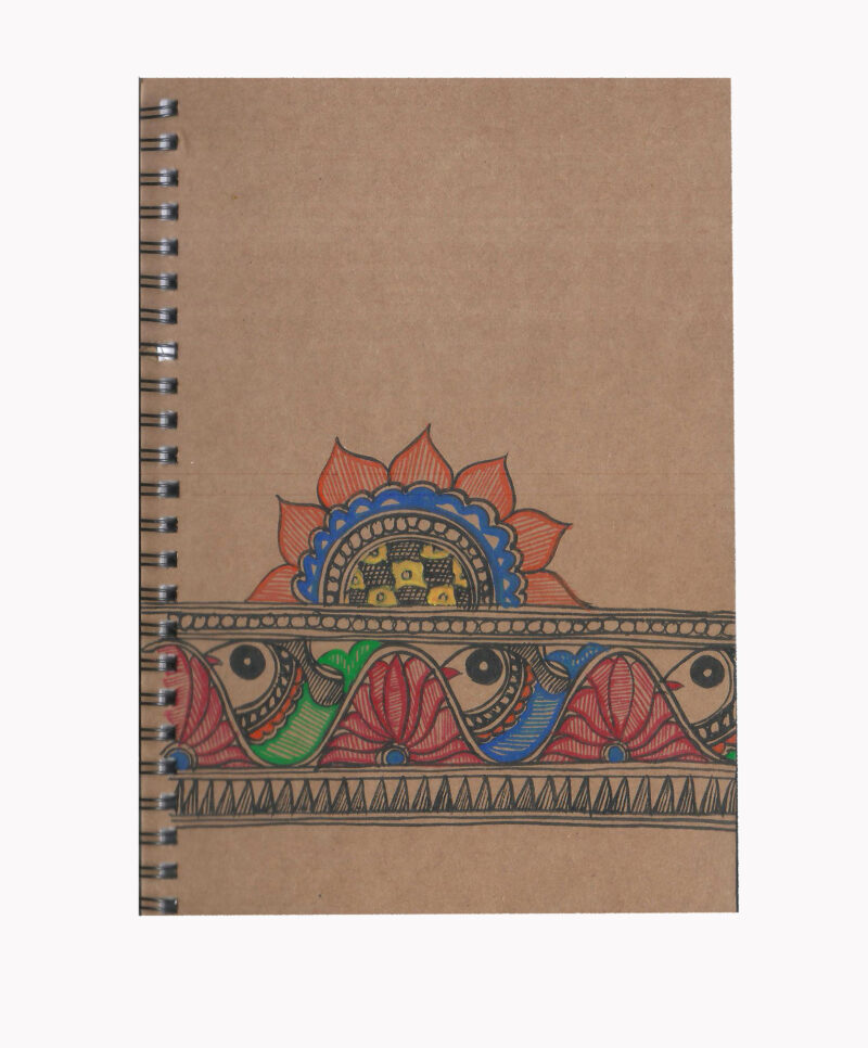 brown notebook with mithila painting